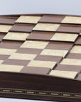 Close up view showing different 3D square levels of solid beech wood 3D Chess Board with walnut and mother of pearl inlays with pyramid-style design and 50mm squares.