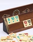 Solid beech wood Rummikub set front and back of racks showing geometric mosaic inlay detail and melamine tiles