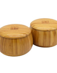 Go Bowls & Stones Set showing closed bamboo bowls containing black and white go stones