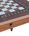 Close-up side top overview of Walnut Chess Table with Drawers featuring Mother of Pearl inlaid design and robust walnut legs, showing closed drawer with handle and chess board playing surface