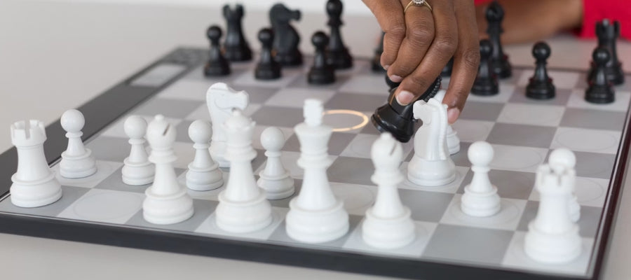 Chess computers from DGT and Millennium designed for training, analysis, and standalone play against dedicated chess engines.