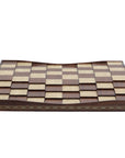 Side view of of solid beech wood 3D Chess Board with walnut and mother of pearl inlays with pyramid-style design and 50mm squares.