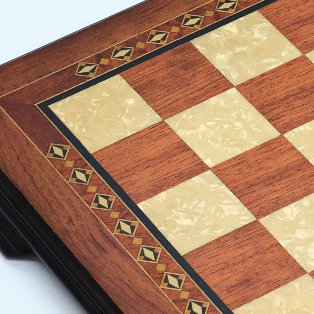 Close up view of rosewood and mother-of-pearl inserts squares in 42cm Beech Chess Board