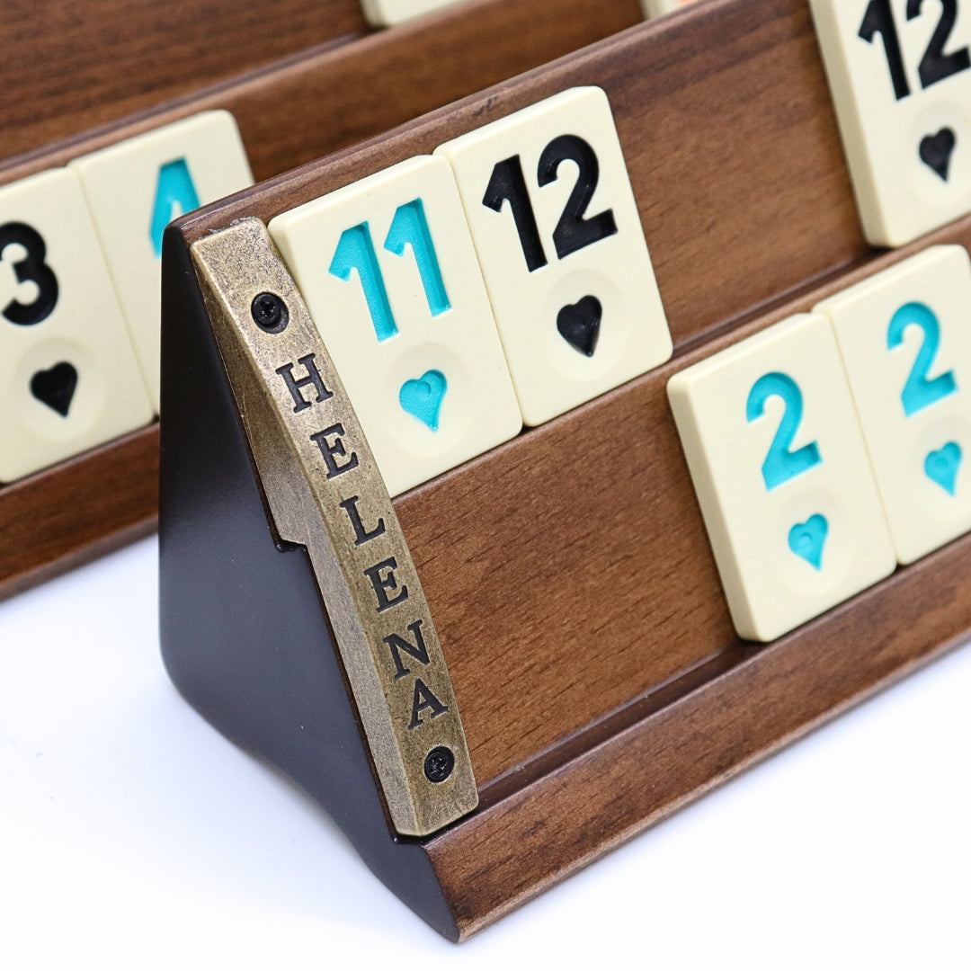 Solid beech wood Rummikub set front showing melamine tiles and metallic plate with logo 