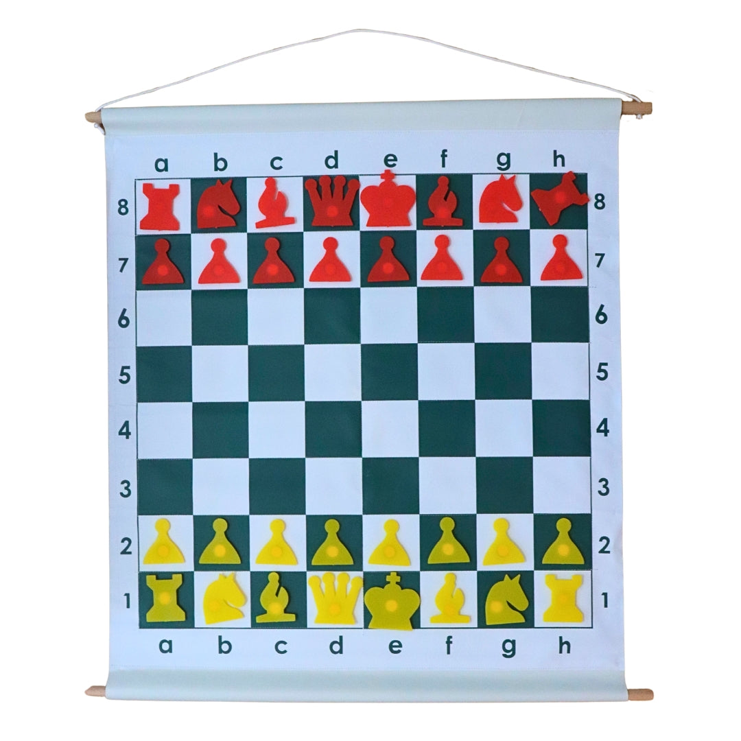 Demonstration chess set roll-up board with red and yellow magnetic pieces hung on wall