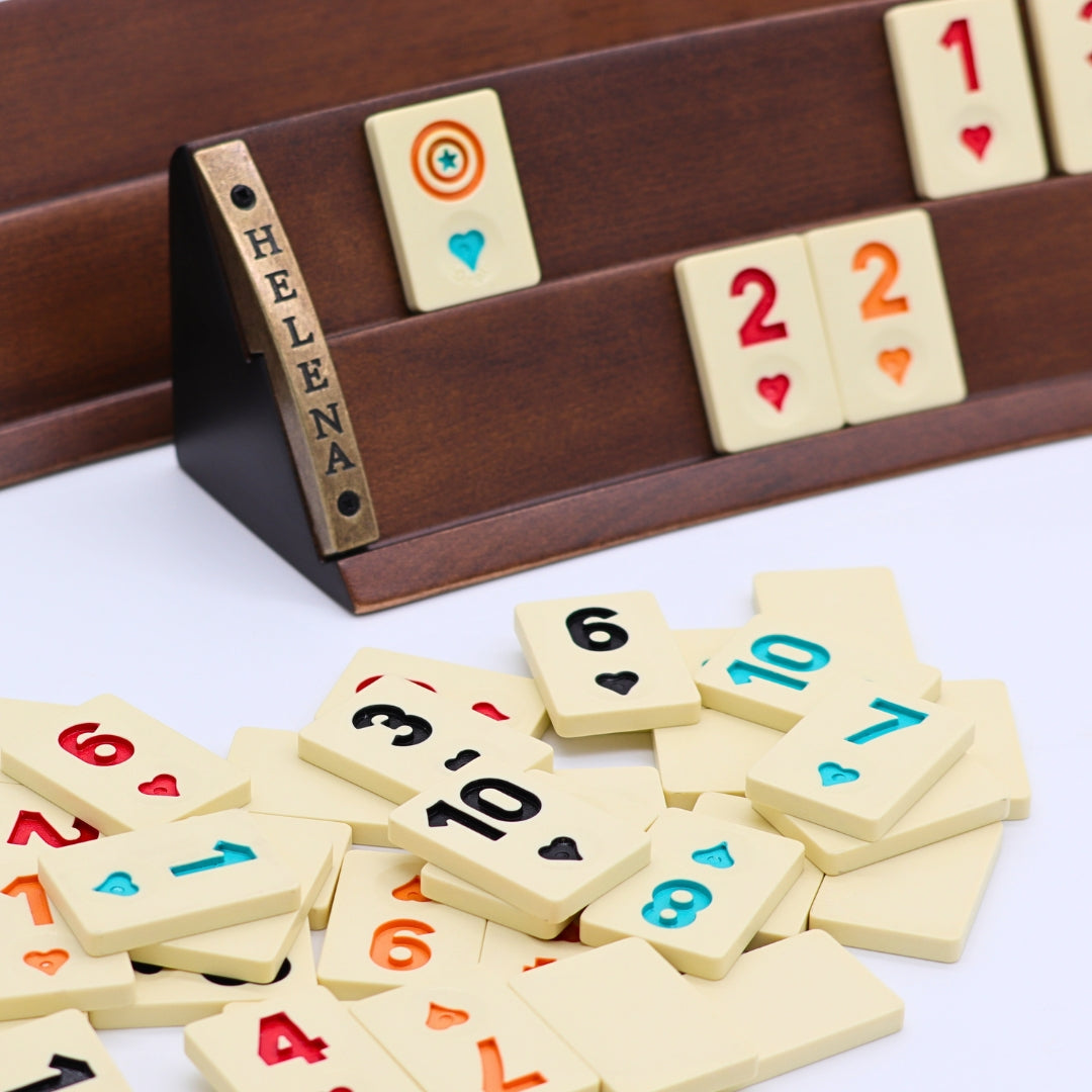 Close-up of luxury Rummikub set showing curved solid beech wood racks and heat-treated melamine tiles by Helena Wood Art