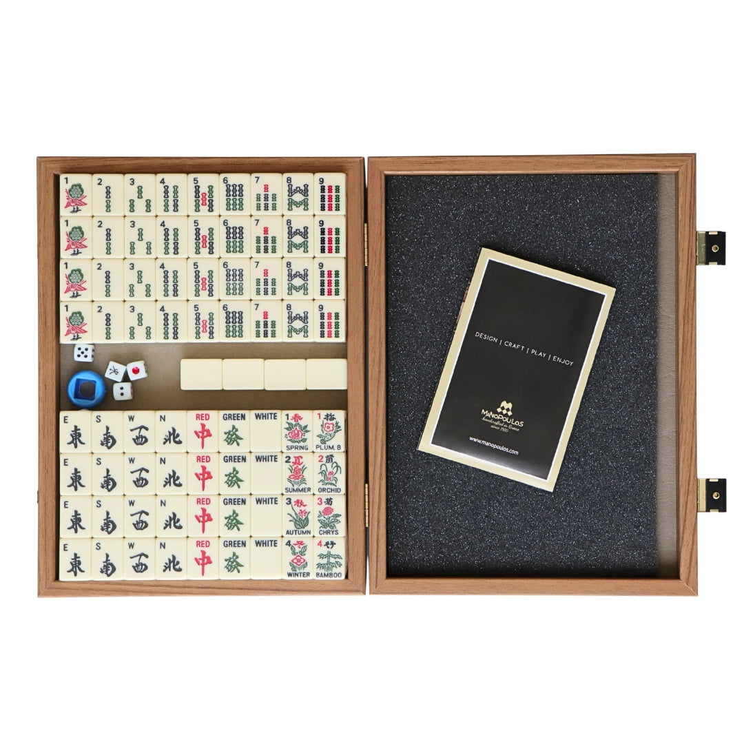 Top view of flat layed premium mahjong tile set in walnut replica case displayed open with organised tiles