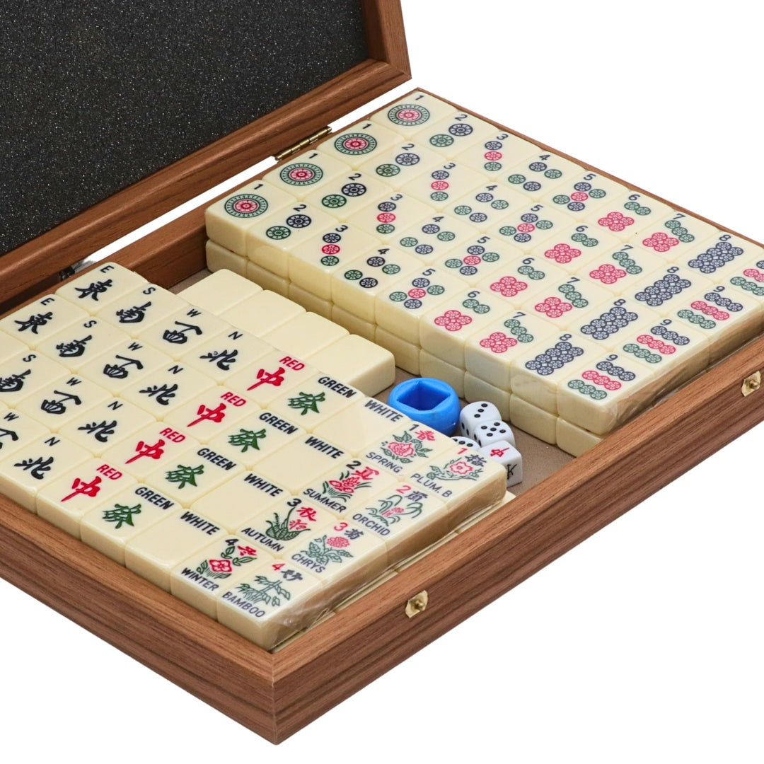 Close-up of Premium mahjong tile set in walnut replica case displayed open with organised tiles