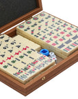 Close-up of Premium mahjong tile set in walnut replica case displayed open with organised tiles