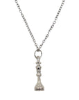 Silver pendant necklace with a King chess piece charm.