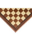 Angled top view of walnut chess board with mother of pearl inlay and bevelled edge with 40mm Squares