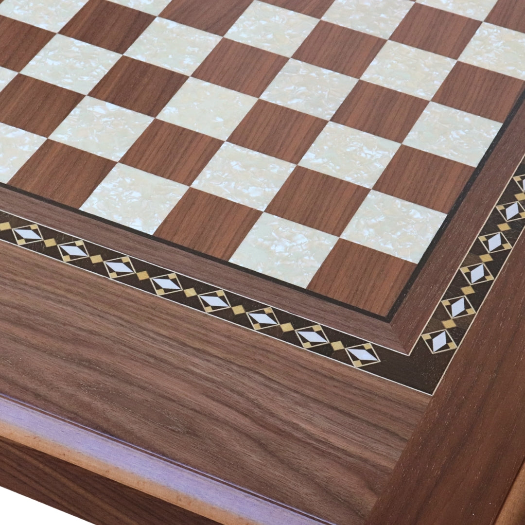 Close-up top view of Walnut Chess Table with Drawers featuring Mother of Pearl inlaid design and robust walnut legs, showing intricate detail of chess board playing surface